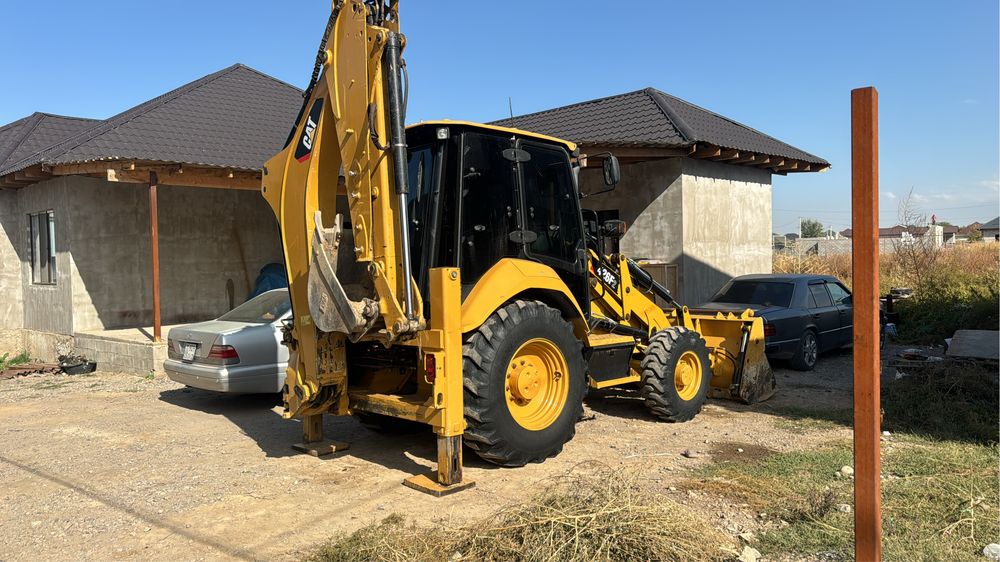 ЭкскаваторПагрузчикCAT