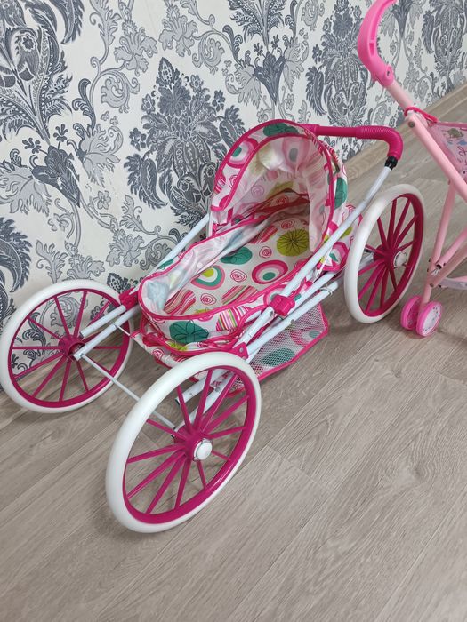 Игрушечная детская коляска