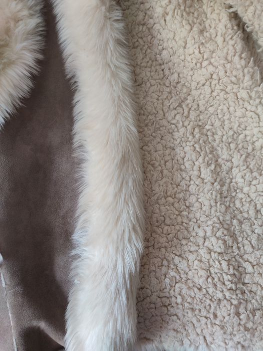 Безрукавка тёплая.