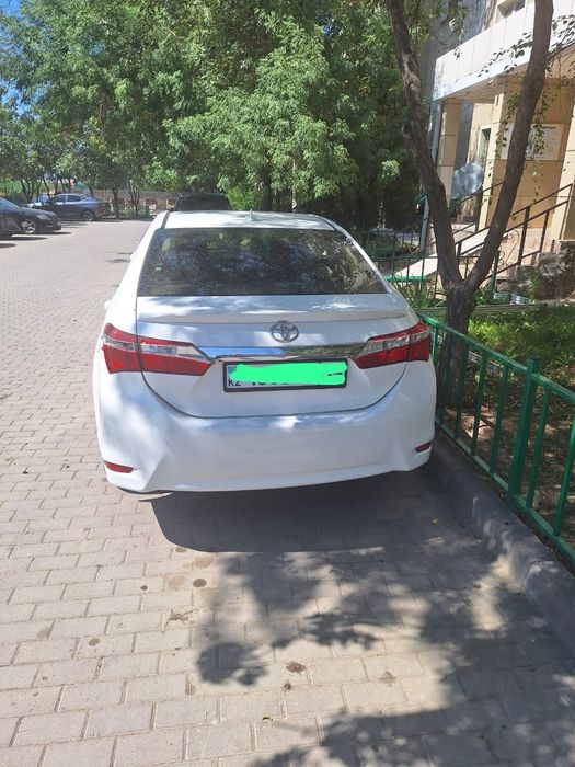 Toyota Corolla, предположительно 2013 годов выпуска.