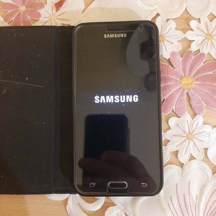 Vind telefon samsung j 3