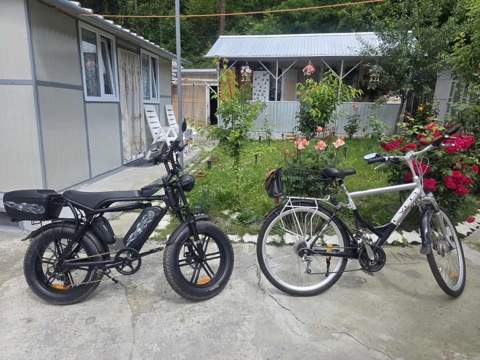 Bicicletă electrică  neagră  in stare functionala