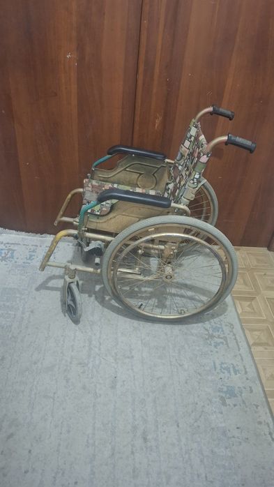 Инвалидная коляска