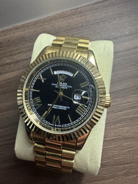 Rolex date date 24k gold black dial