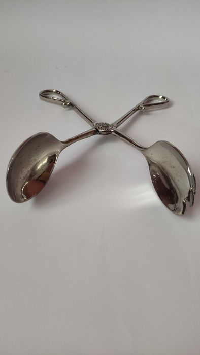 Голяма и  тежка щипка за сервиране на храна