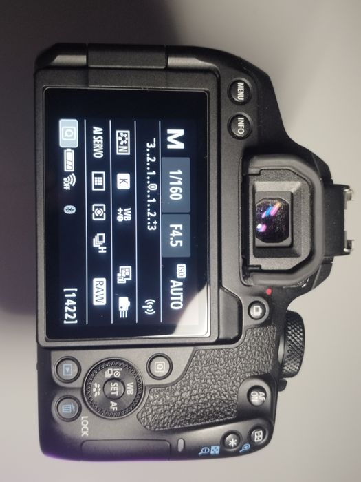 Canon EOS 850D / Rebel T8I + Canon EFS 18-135  IS USM