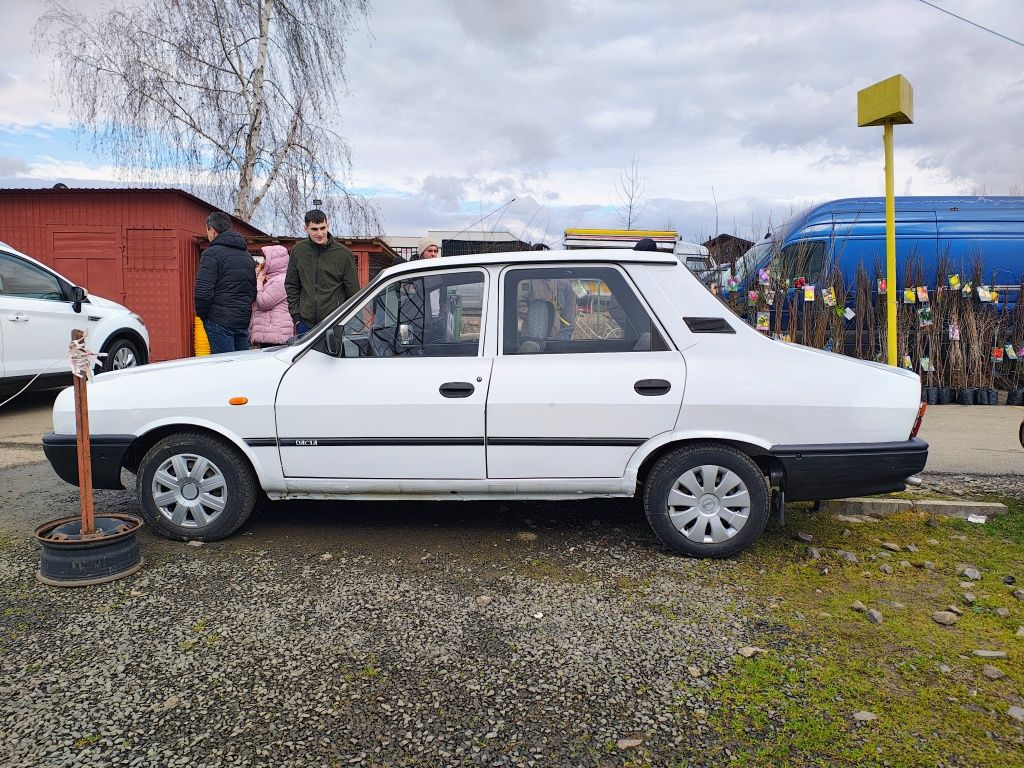 Dacia 1310 an 2001 injecție 1,4 Baia Mare • OLX.ro