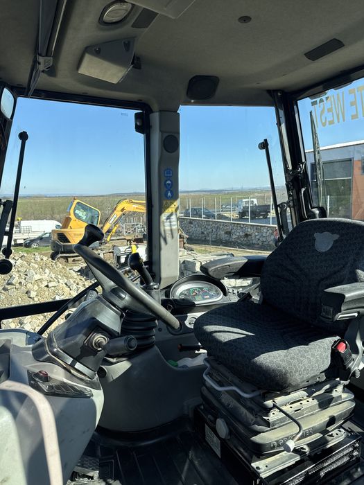 Buldoexcavator Case 580 ST 2019