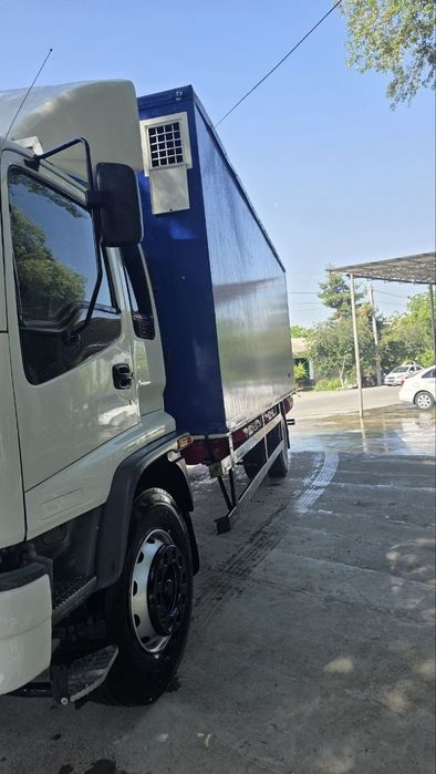 Isuzu Katta bort yuk tashuvchi (10 tonnali)