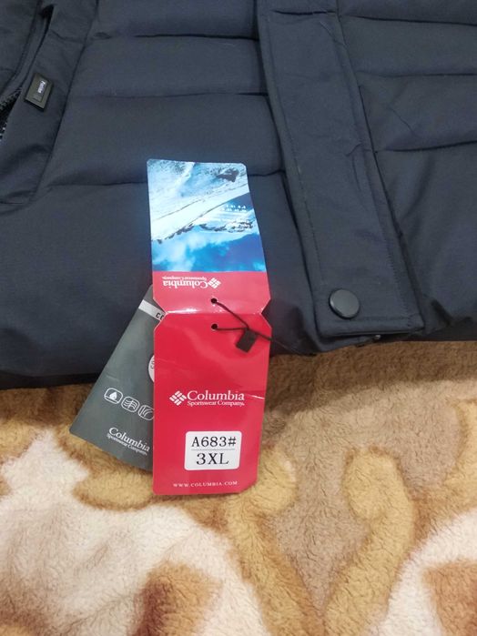 Продам мужской пуховик