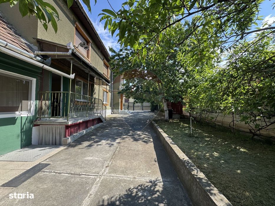 Casă de vânzare în satul Dârlos – teren 1.026 mp