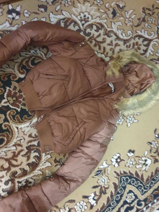 Куртка на девушку б/у