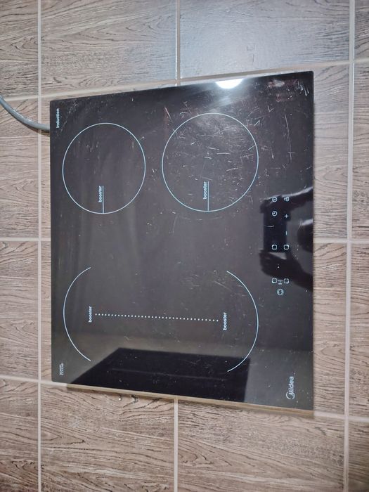 Индукционная плита Midea