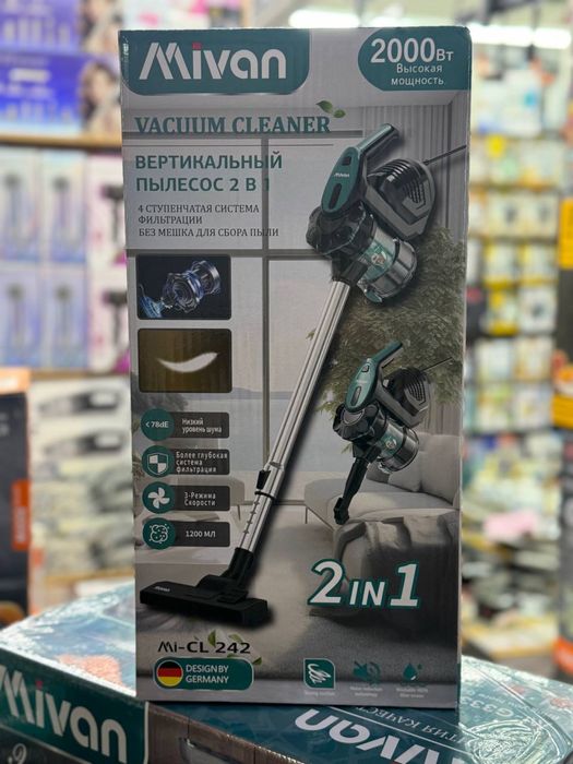 Вертикальный пылесос два в одном ручной.