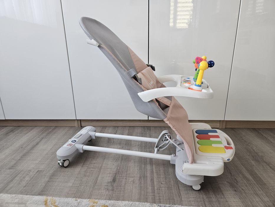 Balansoar bebeluși NiceKids, roz, pliabil, cu pian și jucării