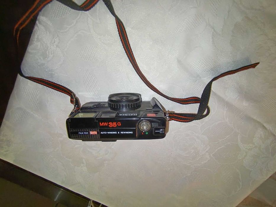 фотоапарати   CANON Power Shot SX420 IS   и  HALINA  MW 35 G