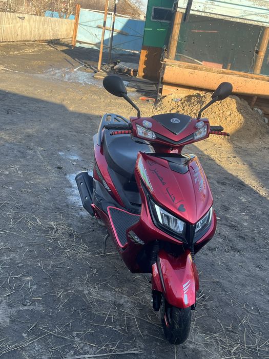 Скутер на ходу ,