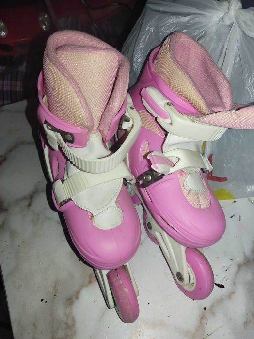 Роликовые коньки