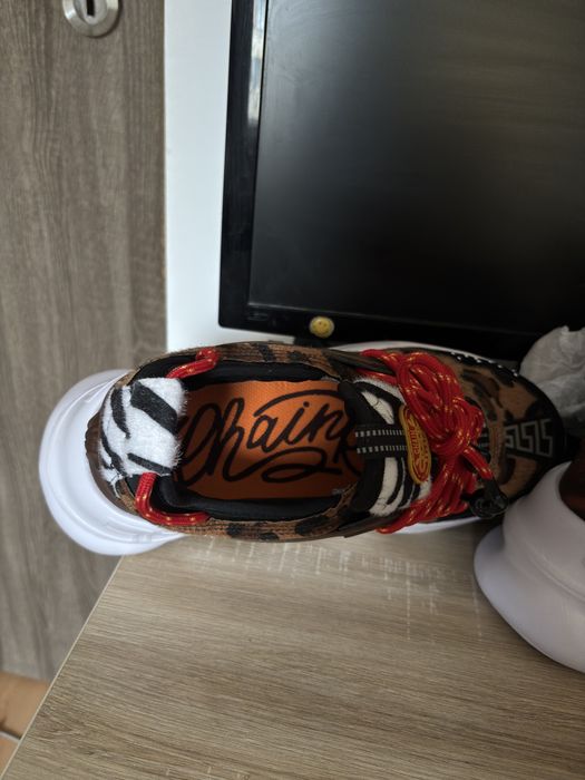 Versace Chain Reaction leopard