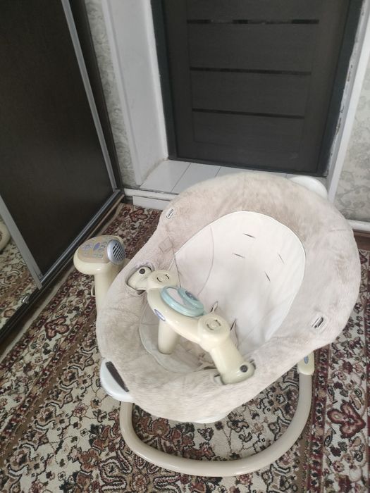 Коляска-качеля для ребенка