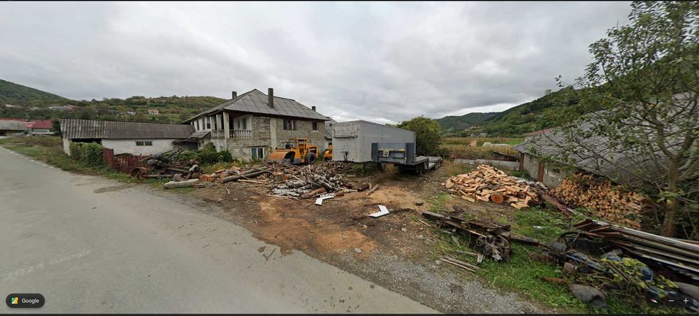 Teren 12 ari cu fost abator și grajd în Feldru