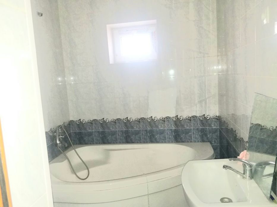 Мирзо Улугбекский район Чингельди угловой дом 2-этажный 6-сотых 8-комн