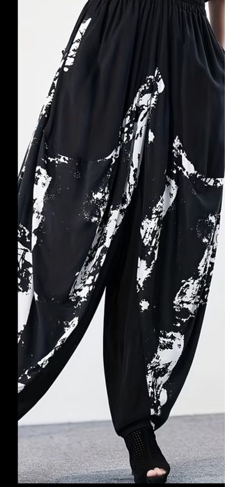 Pantaloni  eleganți femei