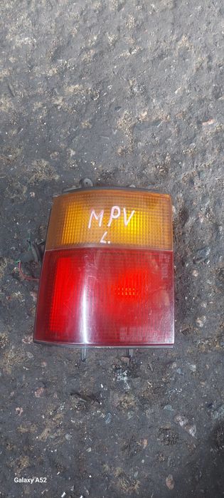 Задний, левый фонарь.  Mazda  MPV  88-98гг.