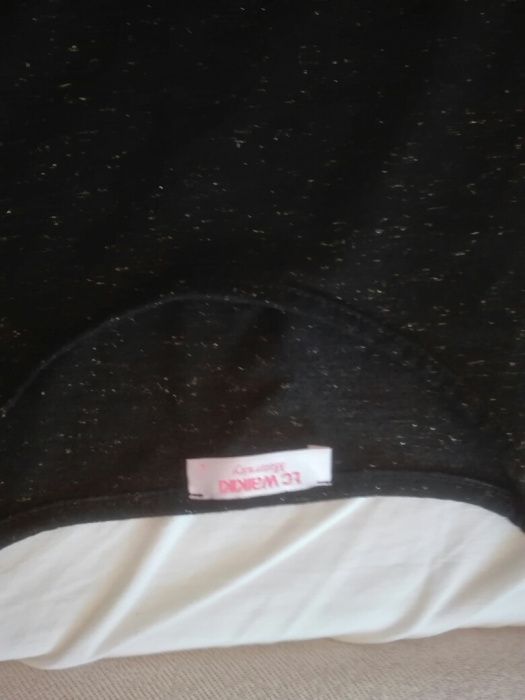 Дрехи за бремени майки.