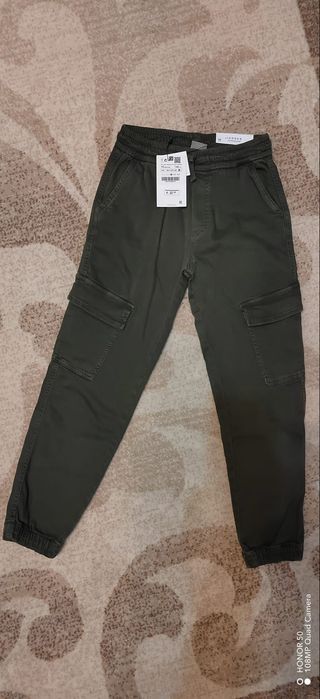 Pantaloni baiat stil cargo  numărul 140 ,