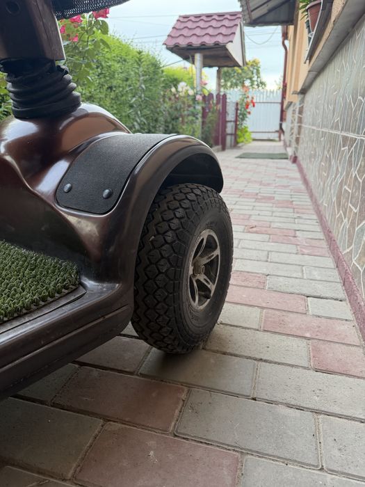 Scuter electric 4 roti