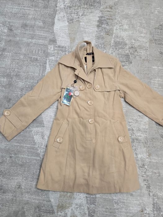 Продам пальто новое