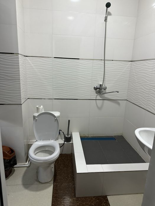 Bez zaks Hotel TJJ mehmonxonasi