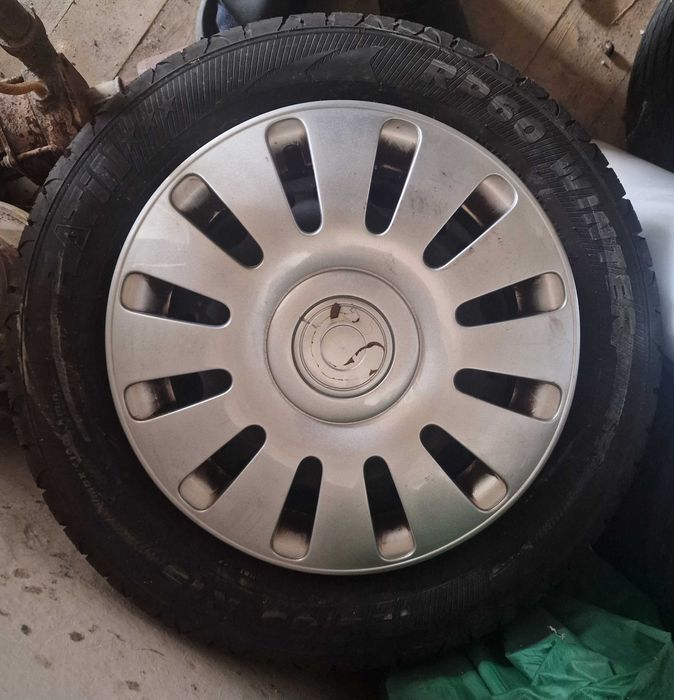 Продавам 8 гуми с джанти и тасове 5×112