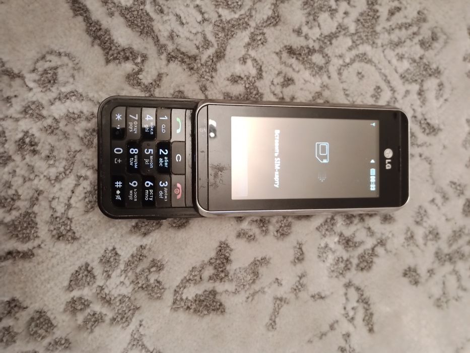 Телефон LG KF690