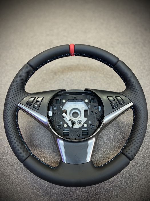 Retapitare/îmbrăcare cu piele naturală și tesire volan