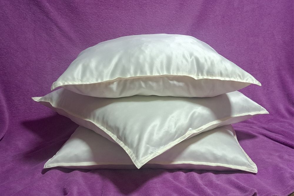 Подушки новые продам