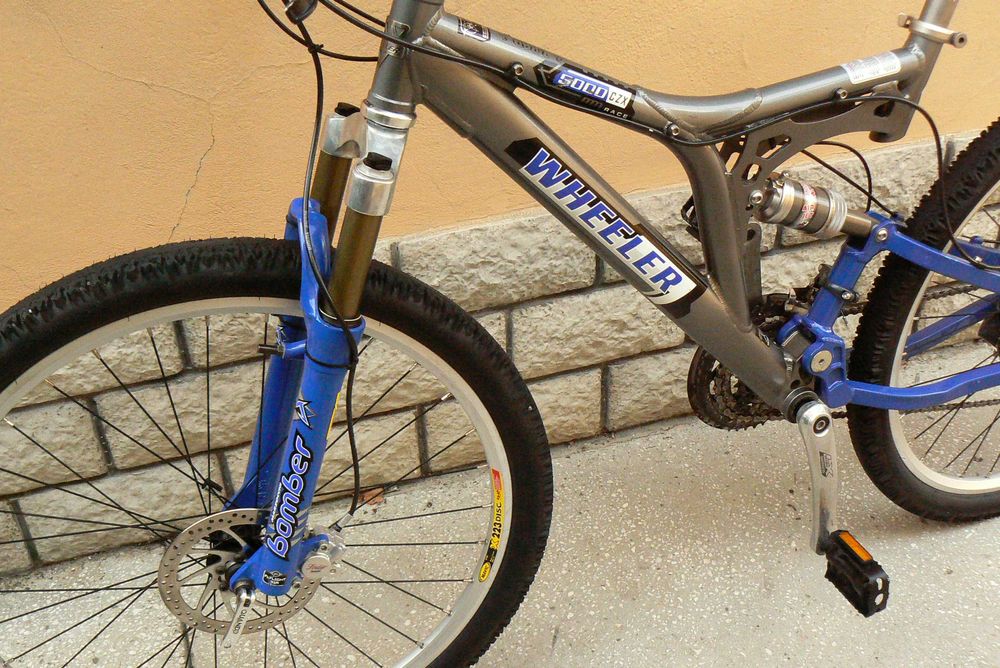 Bicicleta mountain bike full suspensie Wheeler