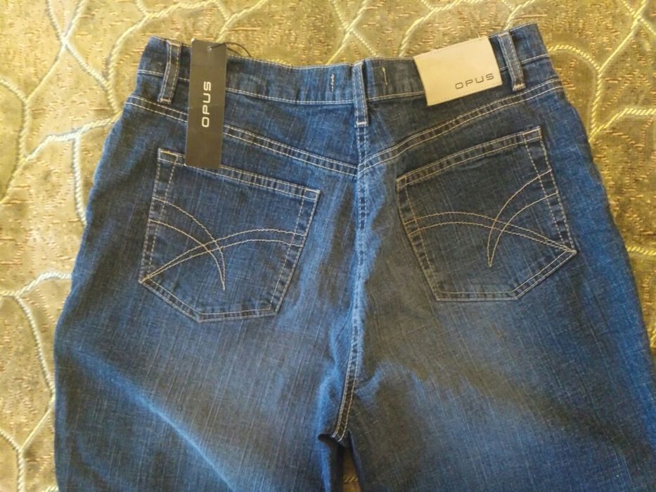 Джинсы новые
