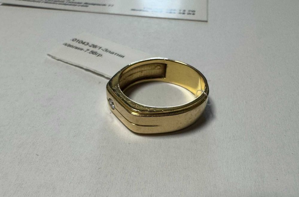 Златен пръстен 7.56гр.18К с диамант+сертификат