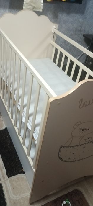 Детская кроватка маятник