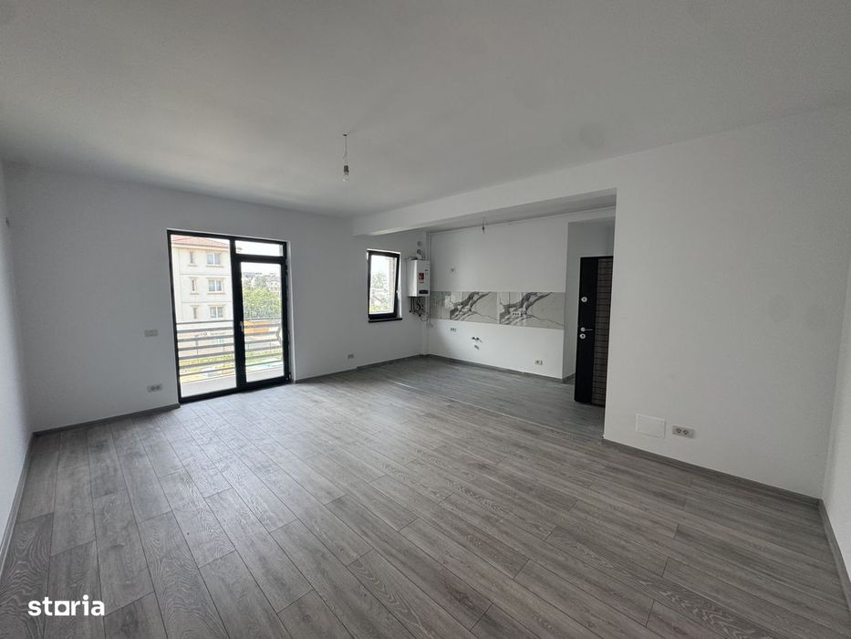 Apartament 2 camere open-space, finisaje premium, parcare inclusa — fotografia 1