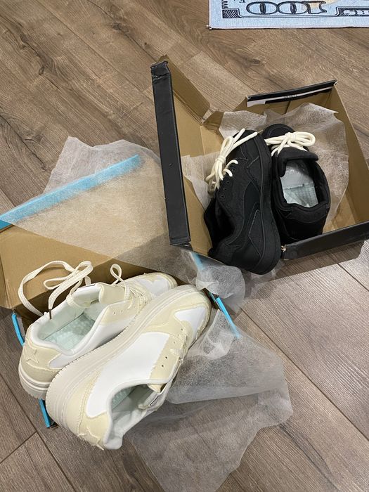 Новые черные кроссовки