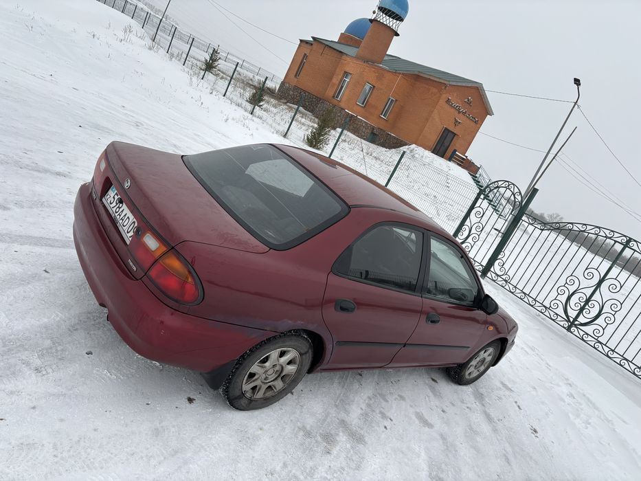 мазда 323 ba владеет женщина