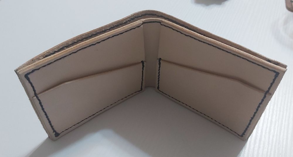 Портфейл от естествена ко а