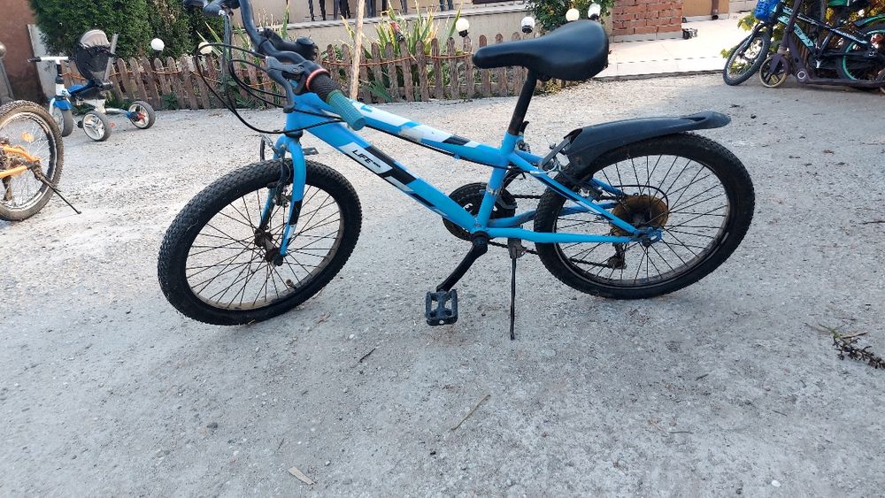 Vând bicicleta copii 9 -12 ani