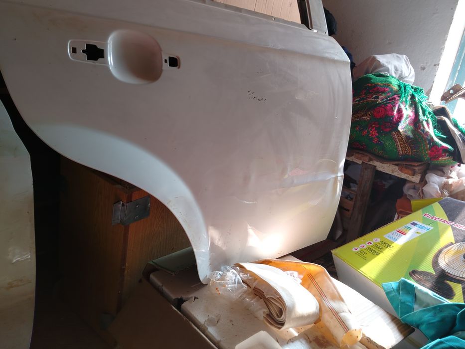 Nexia 3 chap orqa eshik radnoy