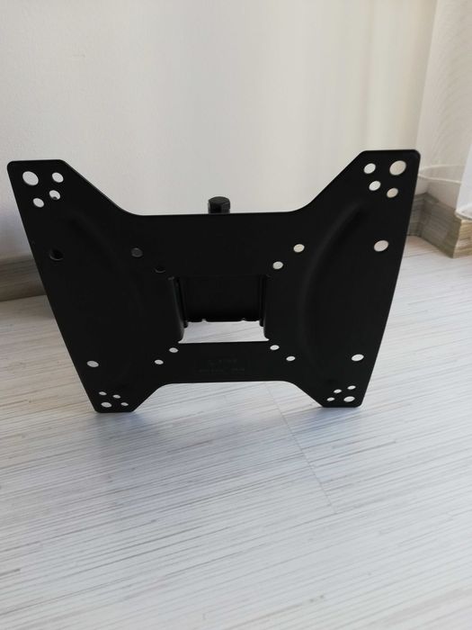 Tv поставка за стена