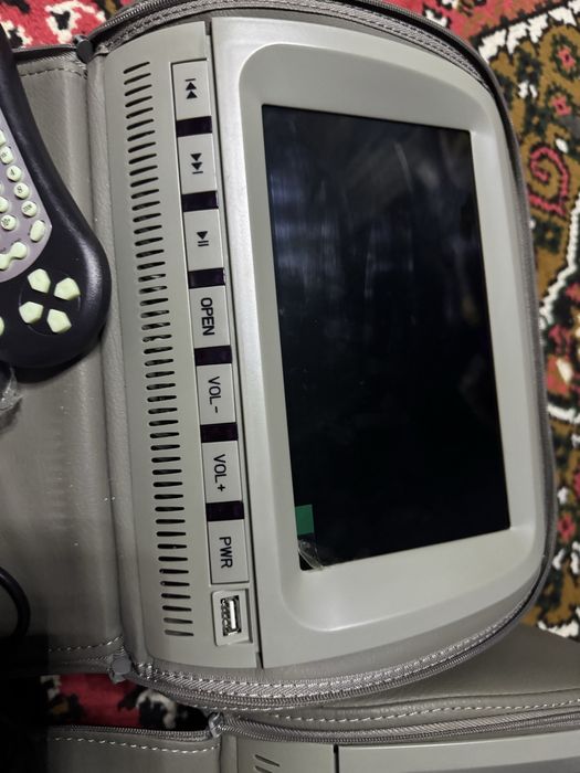 Манитор Подголовник