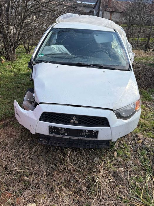 Mitsubishi  Colt /piese dezmebrari